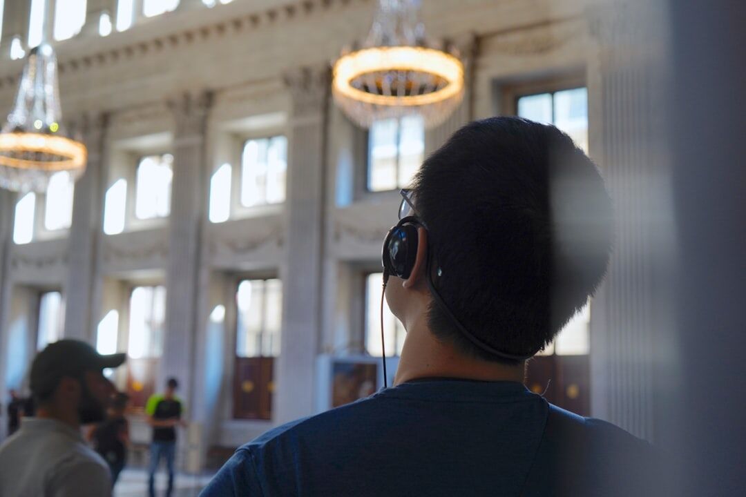 Professional headshot of a Dutch male audio engineer with headphones