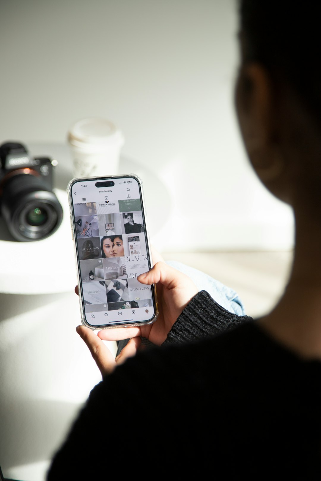 person using smartphone for social media