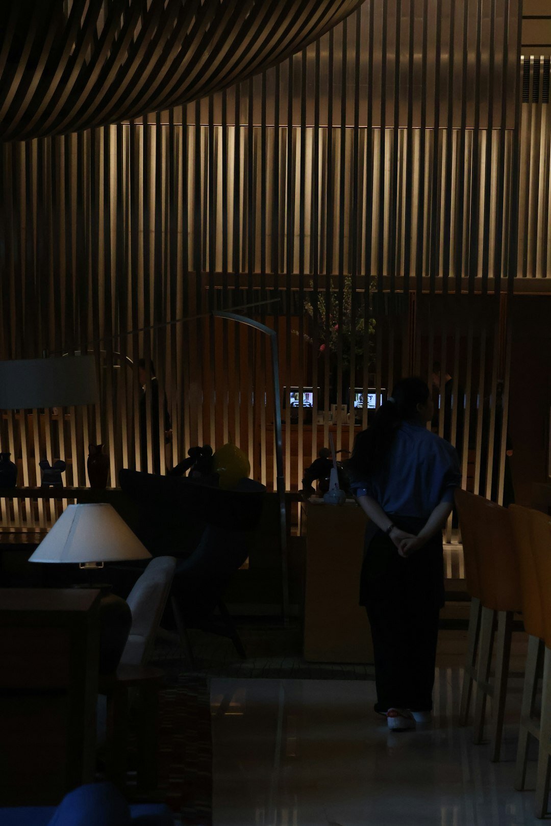 Modern reception area of a creative media studio with warm lighting